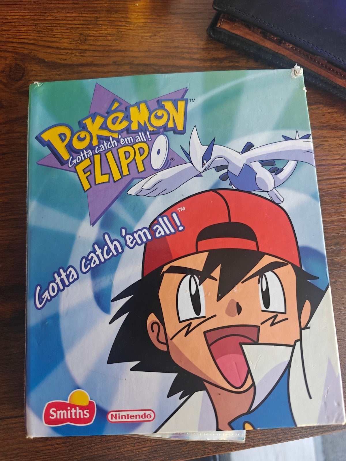 Pokémon Flippo's map met 26 Flippo's, Verzamelen, Ophalen of Verzenden, Verzameling, Met verzamelmap(pen)