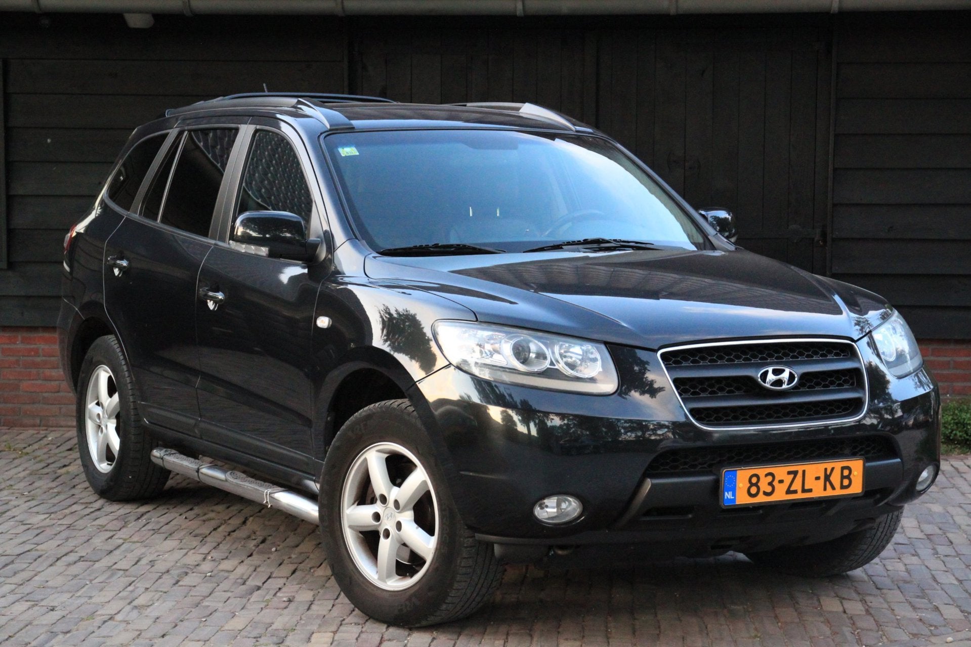 Hyundai Santa Fe 2.7i V6 4WD Business Edition Elek-Dak/Camer, Automaat, Santa Fe, Gebruikt, Zwart