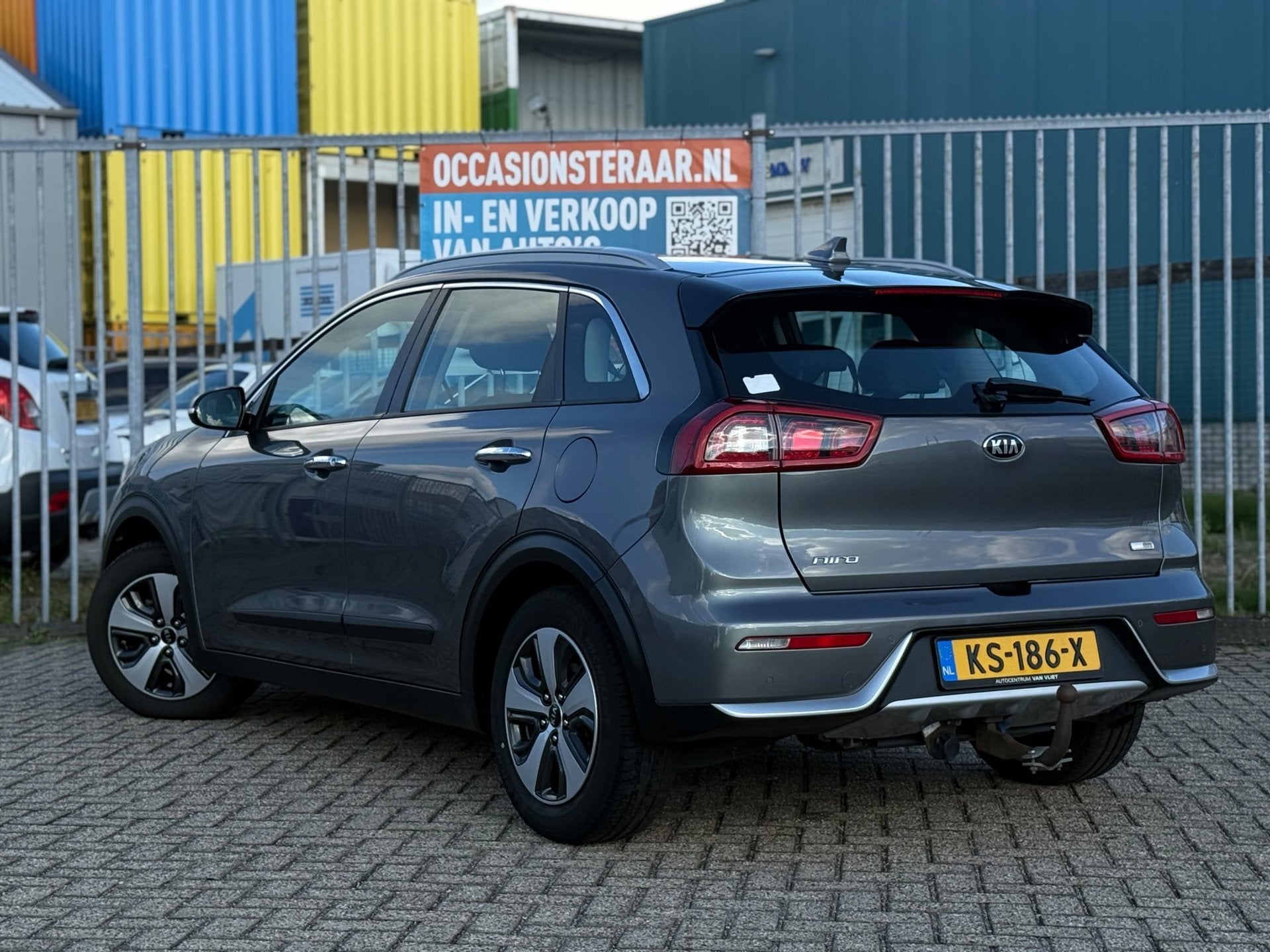 Kia Niro 1.6 GDi Hybrid First Edition#Nap#Aut#Trekhk, Auto's, Gebruikt, 26 km/l, SUV of Terreinwagen, Zilver of Grijs