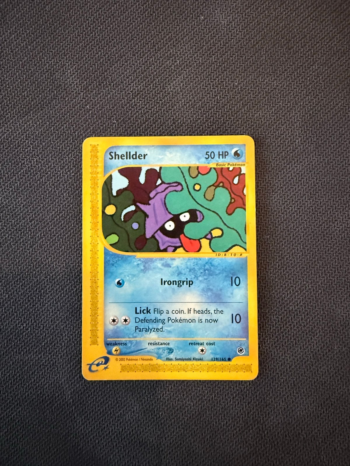 Pokémon Kaart Shellder 129/165 Aquapolis, Ophalen of Verzenden, Gebruikt, Losse kaart