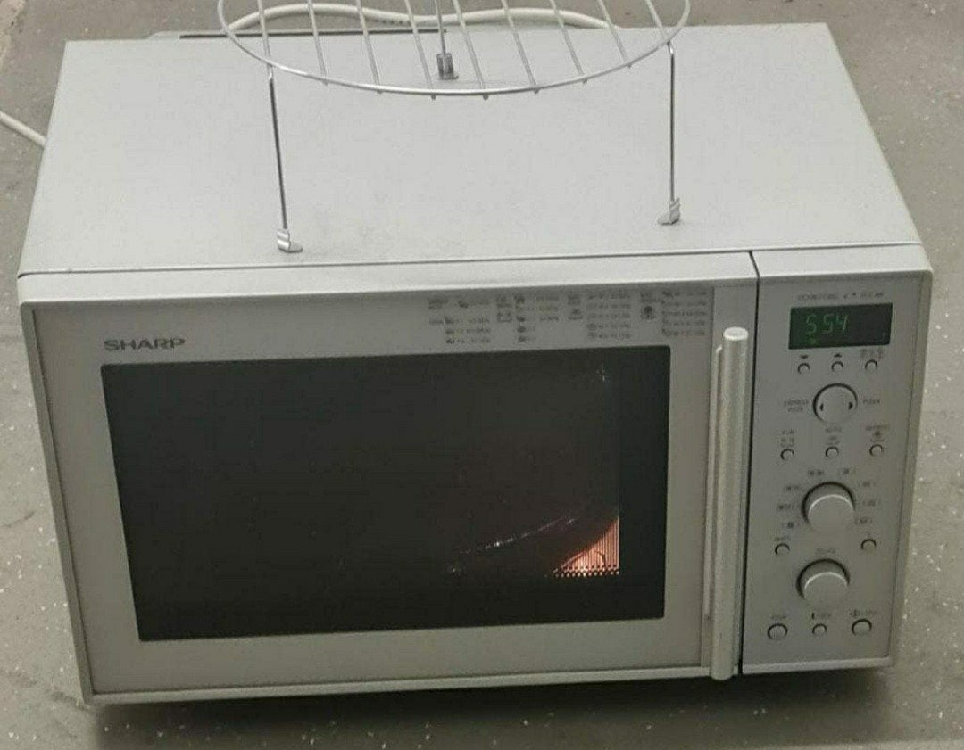 SHARP magnetron zo goed als nieuw. met heteluchtoven, Witgoed en Apparatuur, Magnetrons, Ophalen of Verzenden, Zo goed als nieuw