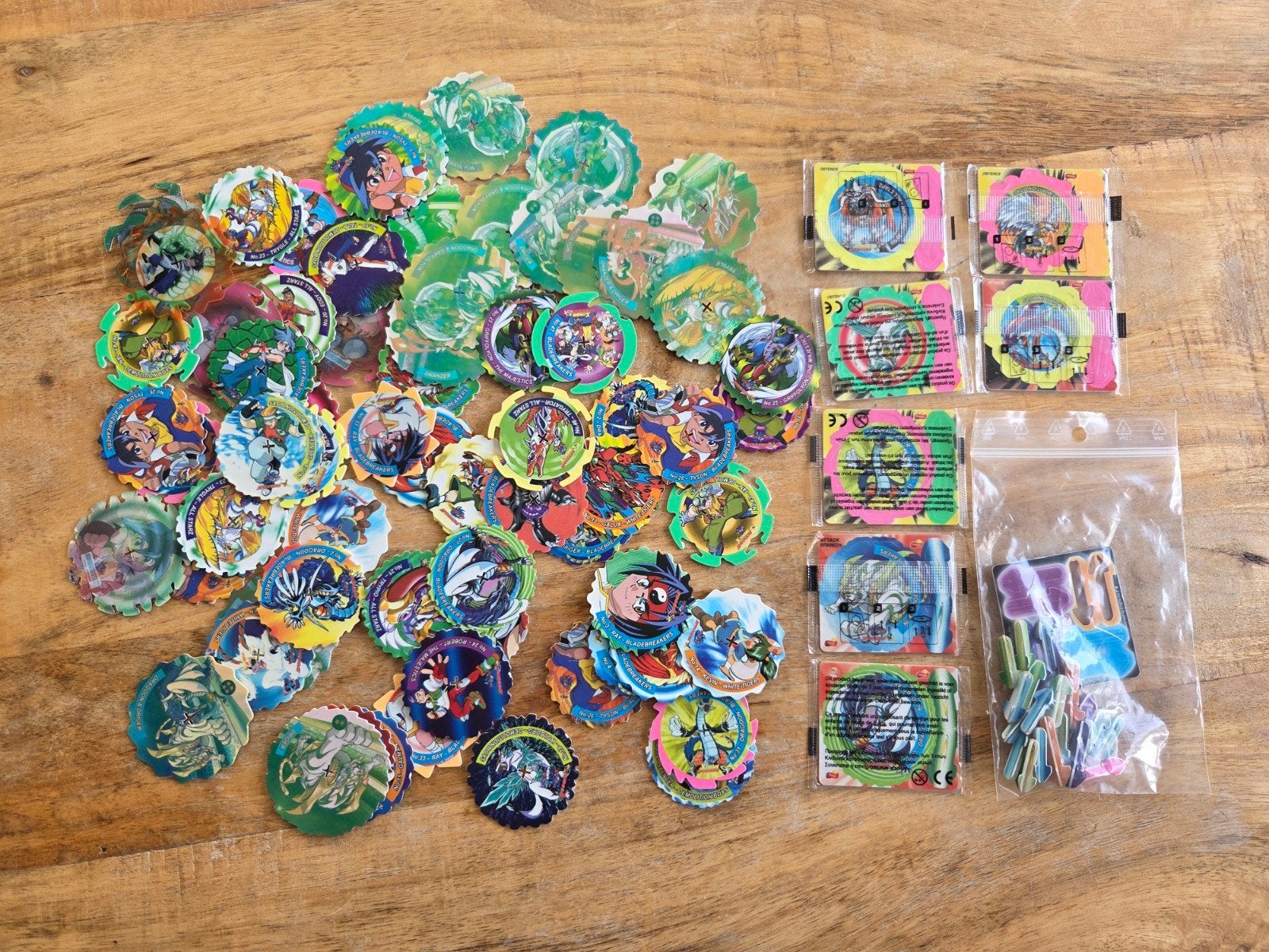 Grote partij Beyblade Extreme Spinners (Smiths / Lay's) 76x, Ophalen of Verzenden, Adventure, Losse flippo's