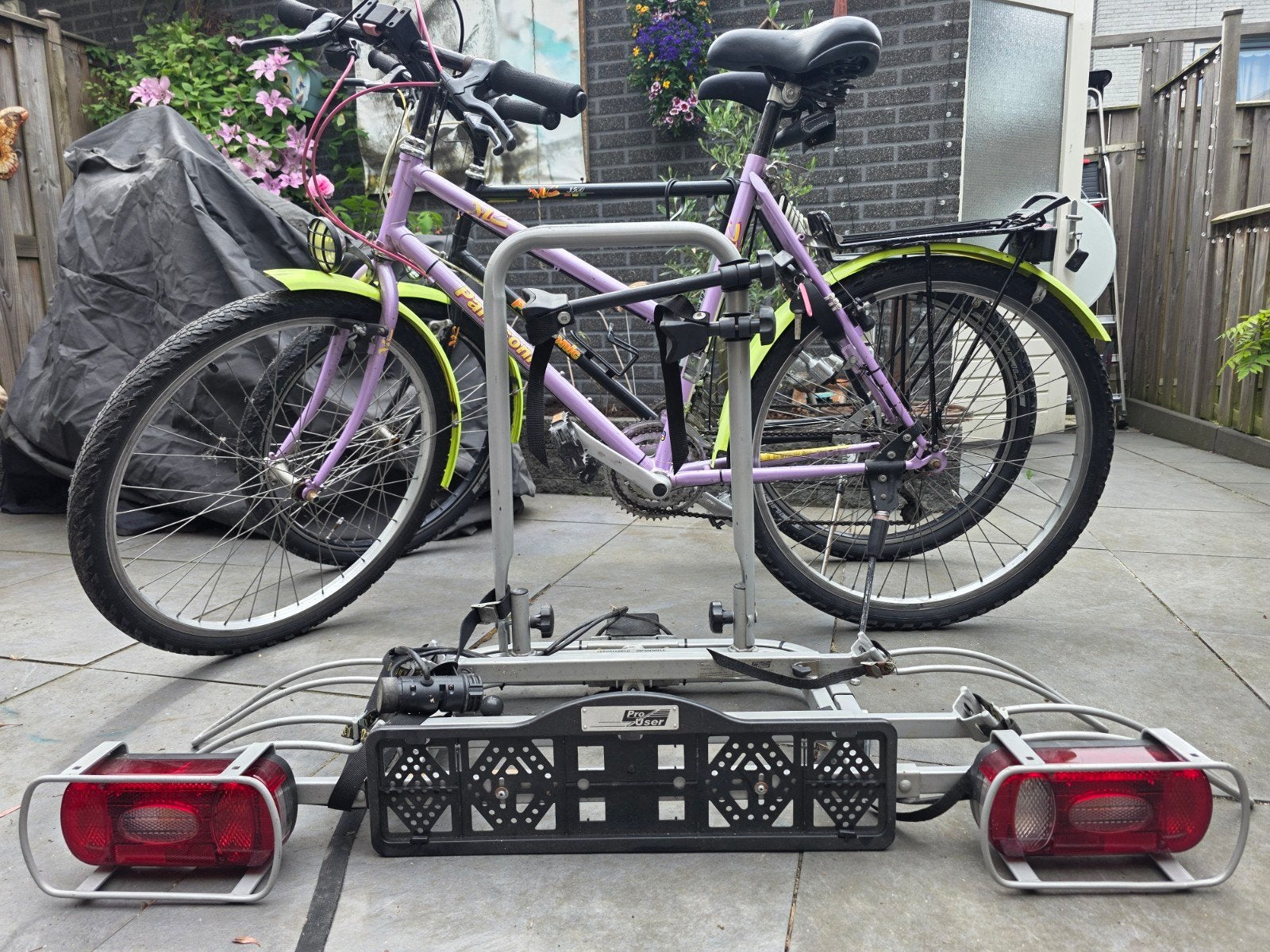 Heren- en damesfiets Panasonic,verstelbaar fietsenrek, Ophalen, Gebruikt