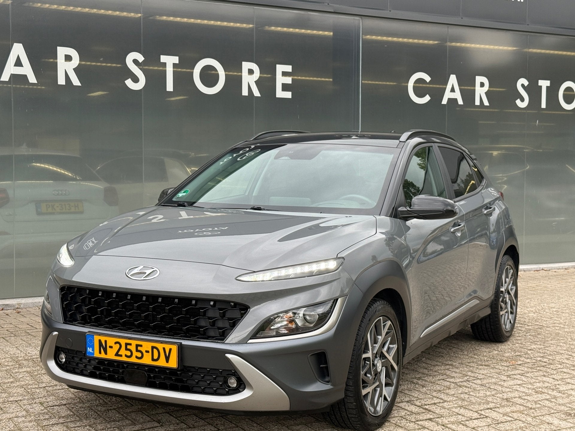 Hyundai Kona 1.6 GDI AUT HEV Fashion Navi|Carplay|Camera|HuD, Dealer onderhouden, Stof, Gebruikt, Origineel Nederlands