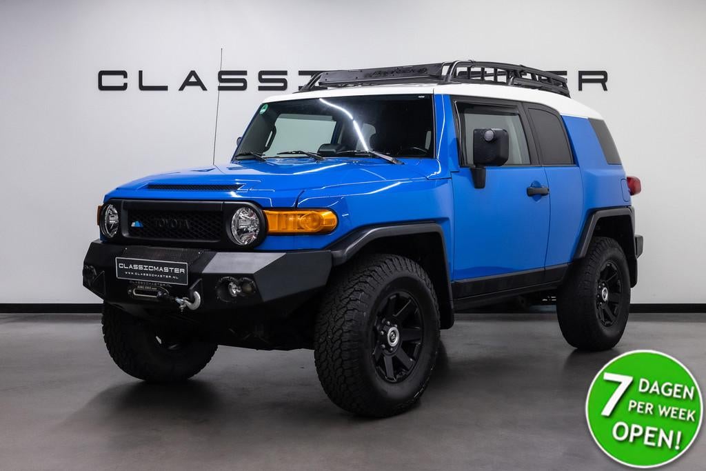 Toyota FJ Cruiser VVT-i V6 Fiscale waarde € 8.000,- Grijs, Auto's, Toyota, Automaat, Stof, Gebruikt, Blauw