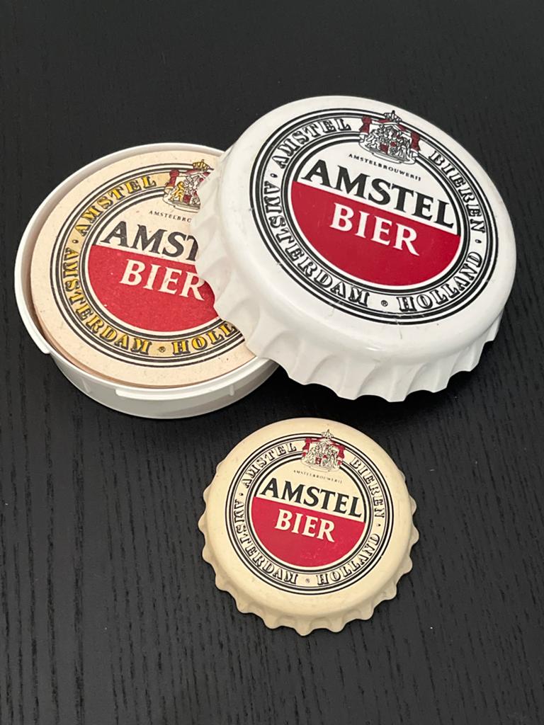 Amstel bier onderzetters in houder met bieropener, Gebruikt, Ophalen of Verzenden, Amstel, Nvt