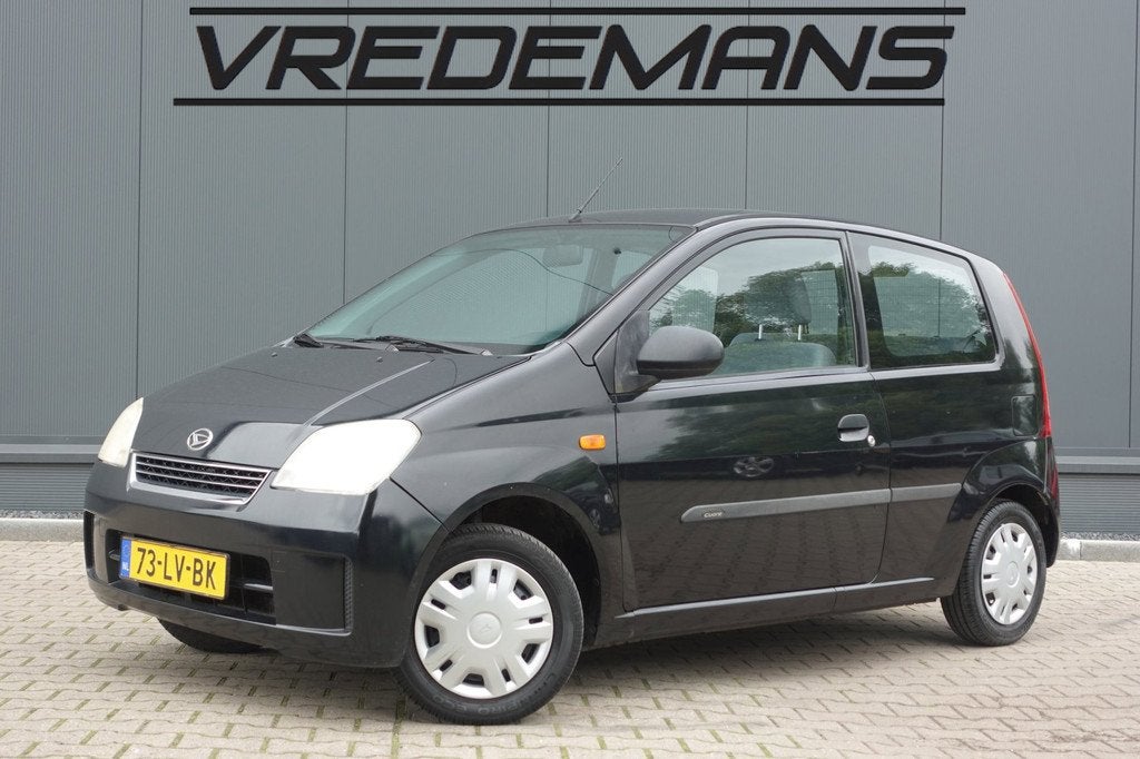 Daihatsu Cuore 1.0-12V Tokyo LEES TEKST, Auto's, Daihatsu, Stof, 18 €/maand, 4 stoelen, Cuore