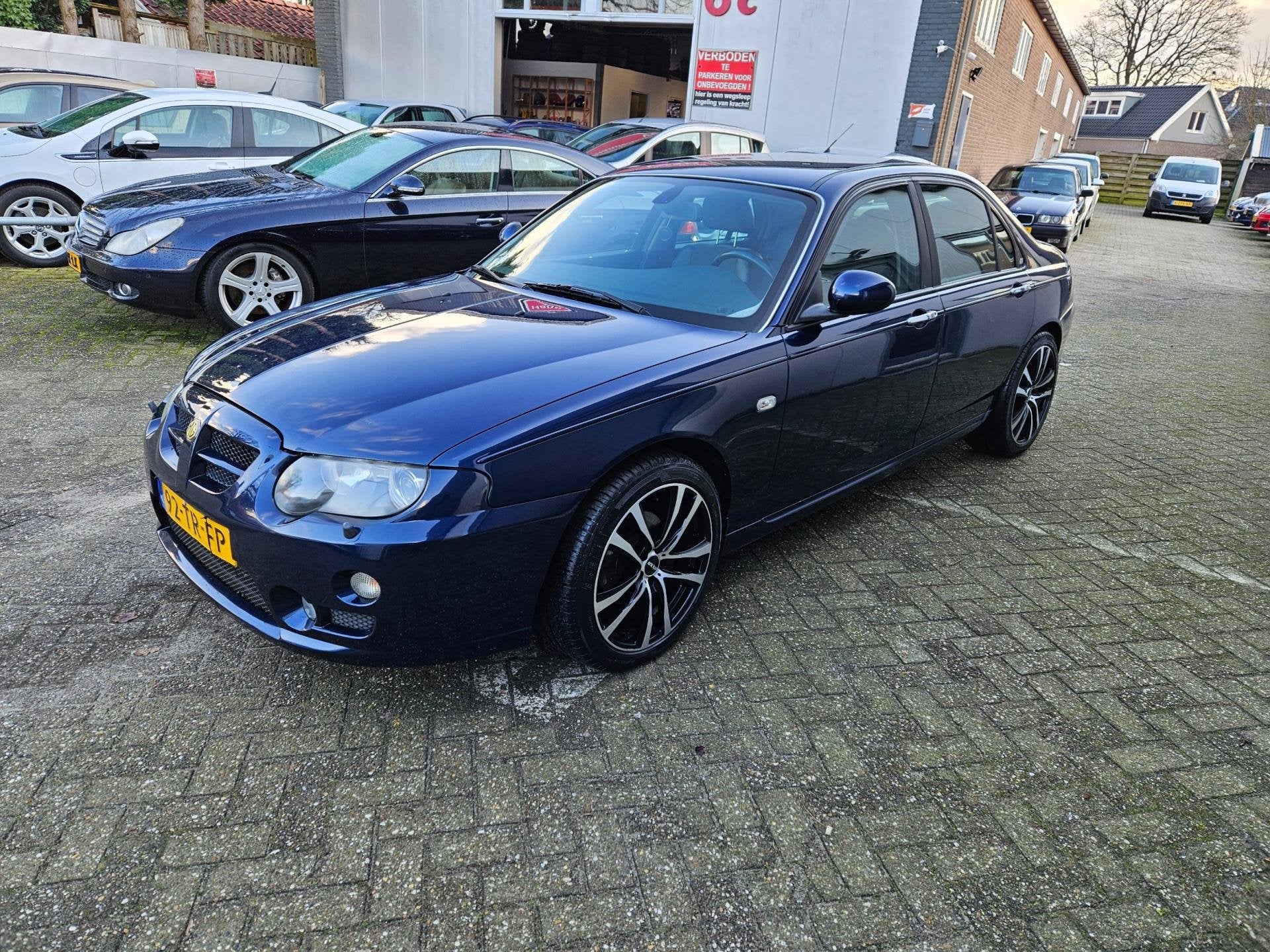 MG ZT 2.0 CDTi 135 / Leer / Clima / Navi / Cruise, Auto's, Voorwielaandrijving, Zwart, 4 cilinders, Blauw