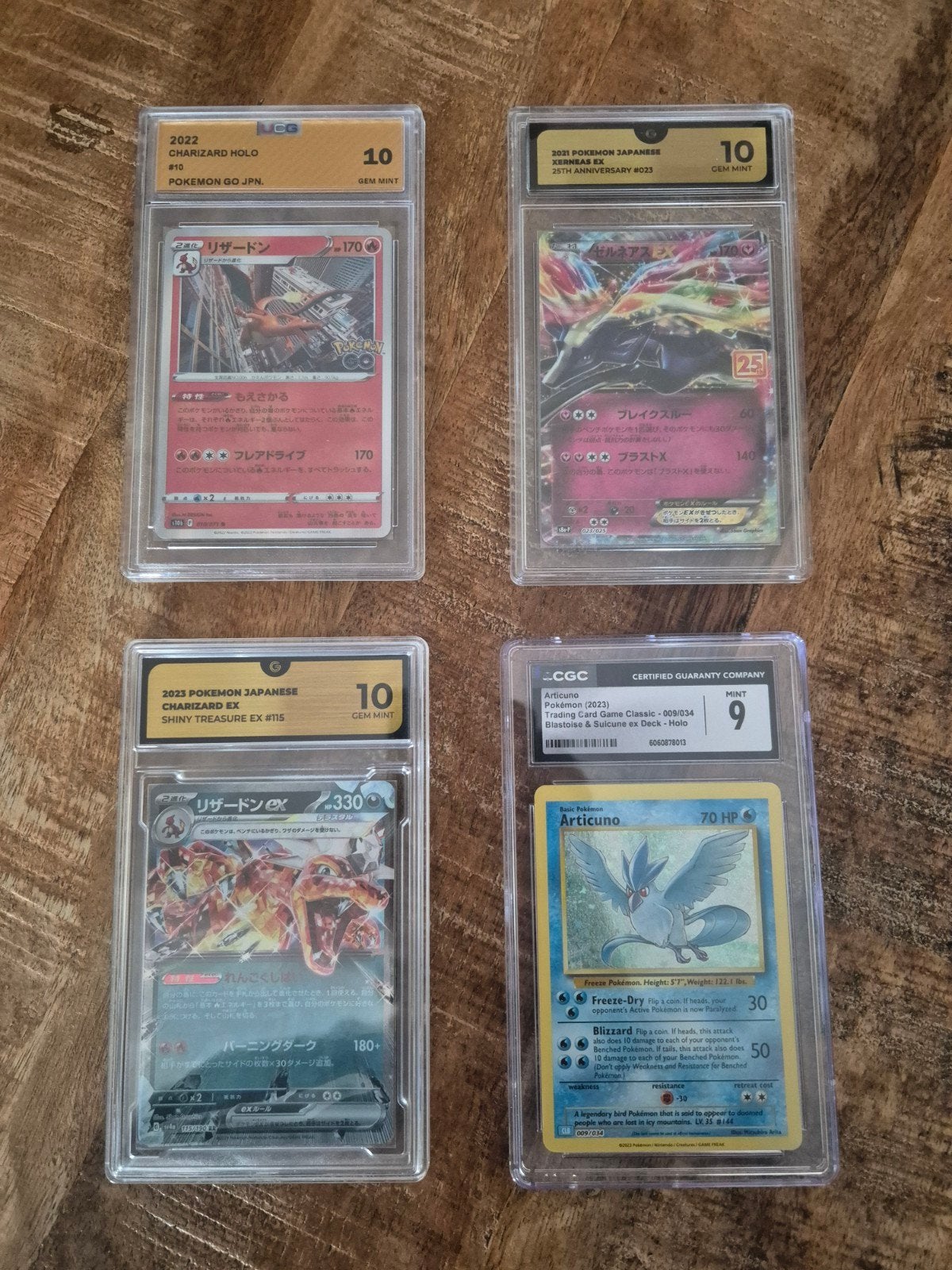Pokémon Kaarten Collectie - Graded Charizard & Articuno, Ophalen of Verzenden