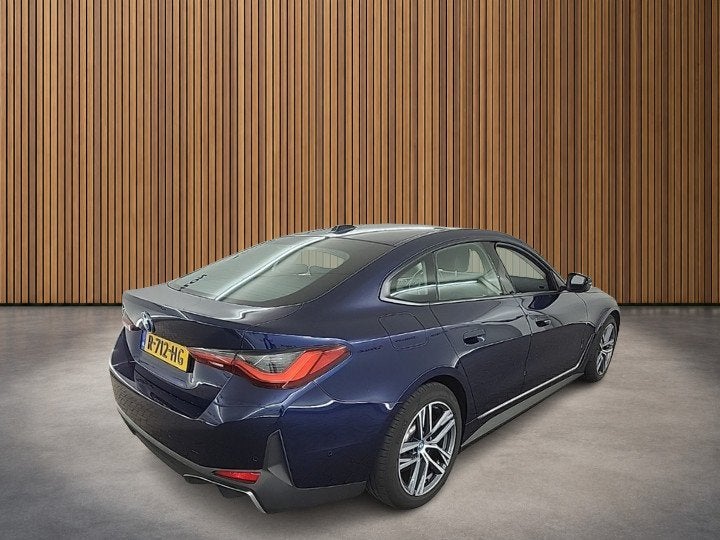BMW i4 eDrive40 84 kWh 3-Fase 1e-Eig. & Dealer-Onderh BOVAG-, Auto's, Achterwielaandrijving, Gebruikt, Blauw, 340 pk