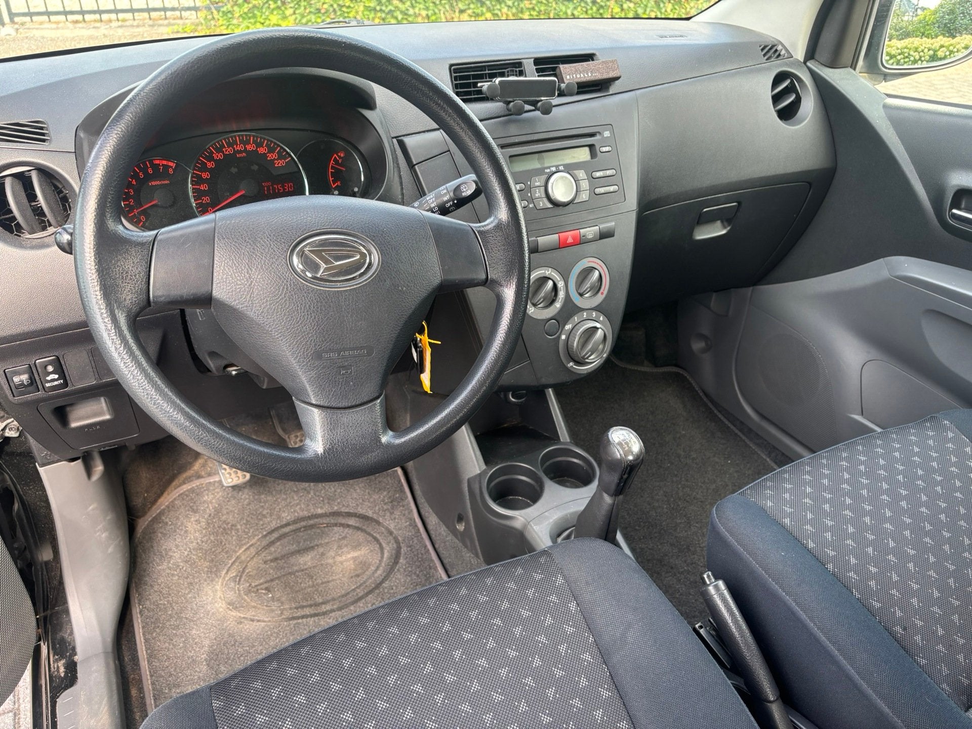 Daihatsu Cuore 1.0 Trend, Auto's, Voorwielaandrijving, Stof, Zwart, 18 €/maand