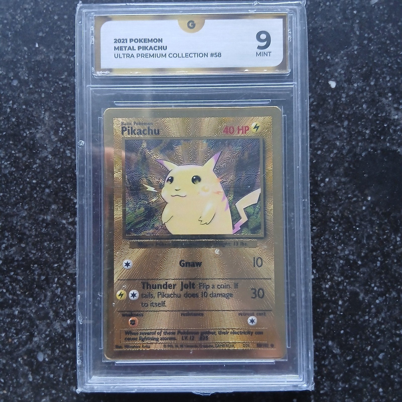 2021 Pokemon Metal Pikachu Global Grading 9 Mint, Ophalen of Verzenden, Zo goed als nieuw, Losse kaart, Foil