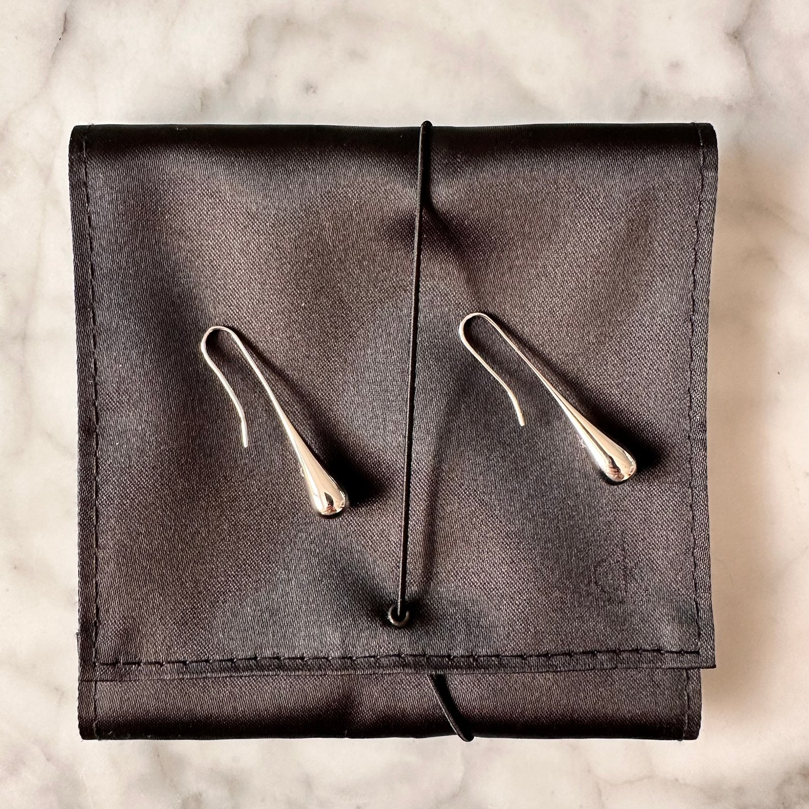 CK Calvin Klein Ellipse Oorbelle Zilverkleurig Staal, Sieraden, Tassen en Uiterlijk, Oorbellen, Overige materialen, Ophalen of Verzenden