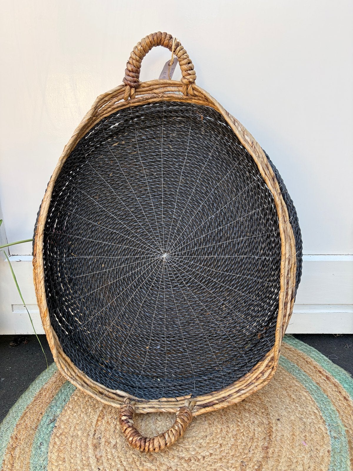 Zwarte rieten lectuurmand met handvaten - Ø 57cm, Ophalen, Met handvat, Gebruikt, Natuurlijk materiaal