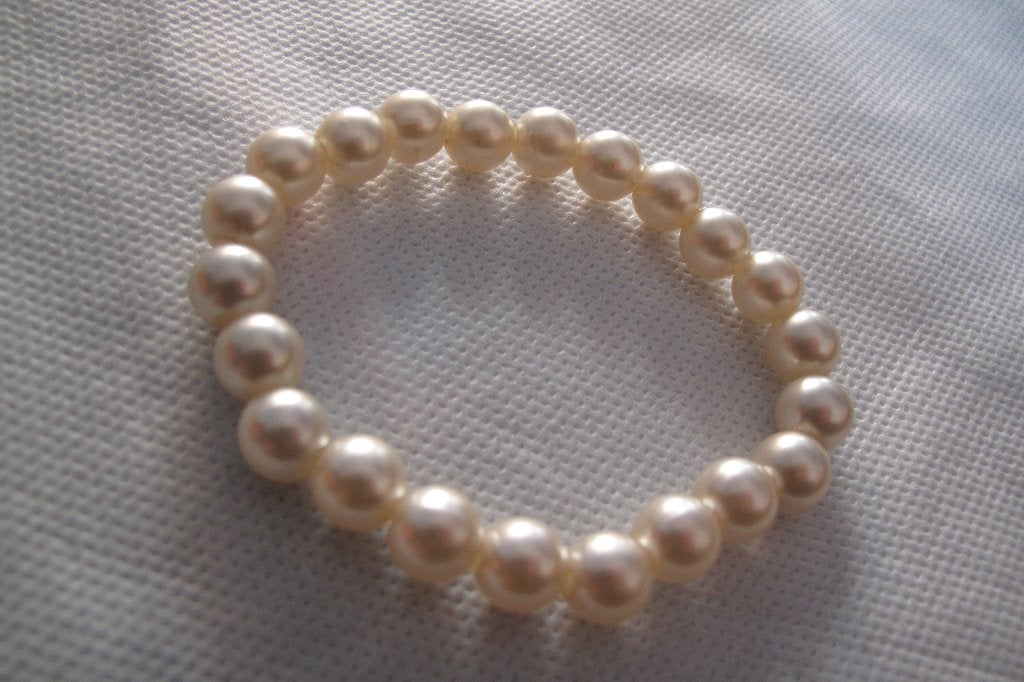 Pearl bracelet (H&M), Sieraden, Tassen en Uiterlijk, Armbanden, Ophalen of Verzenden, Nieuw, Beige, Elastiek