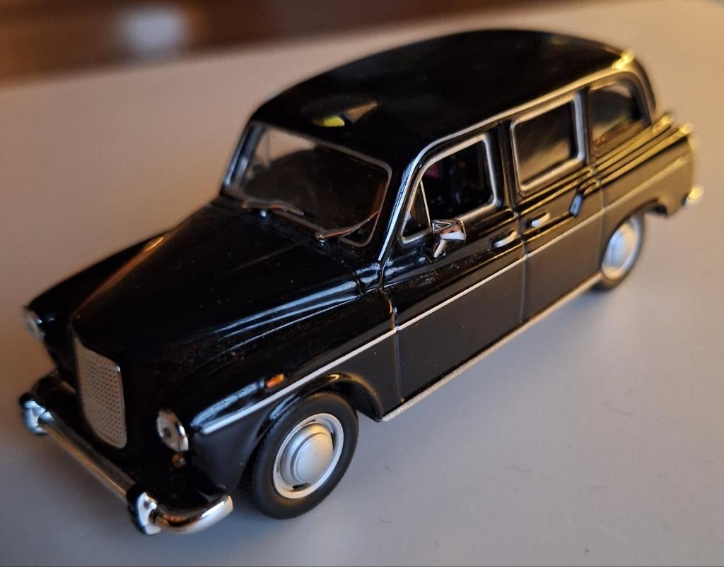 Welly- Austin fx4 london taxi, Ophalen of Verzenden, Zo goed als nieuw, Auto