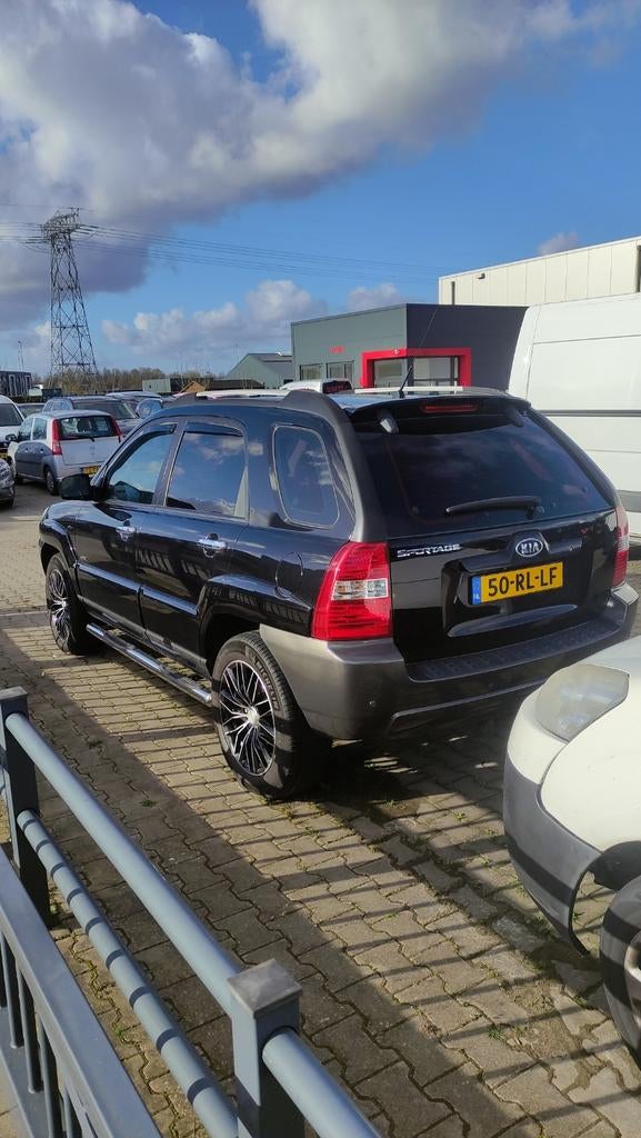 Kia Sportage 2.0 104KW 2005 Zwart, Auto's, Kia, 4 cilinders, Zwart, Origineel Nederlands, Handgeschakeld