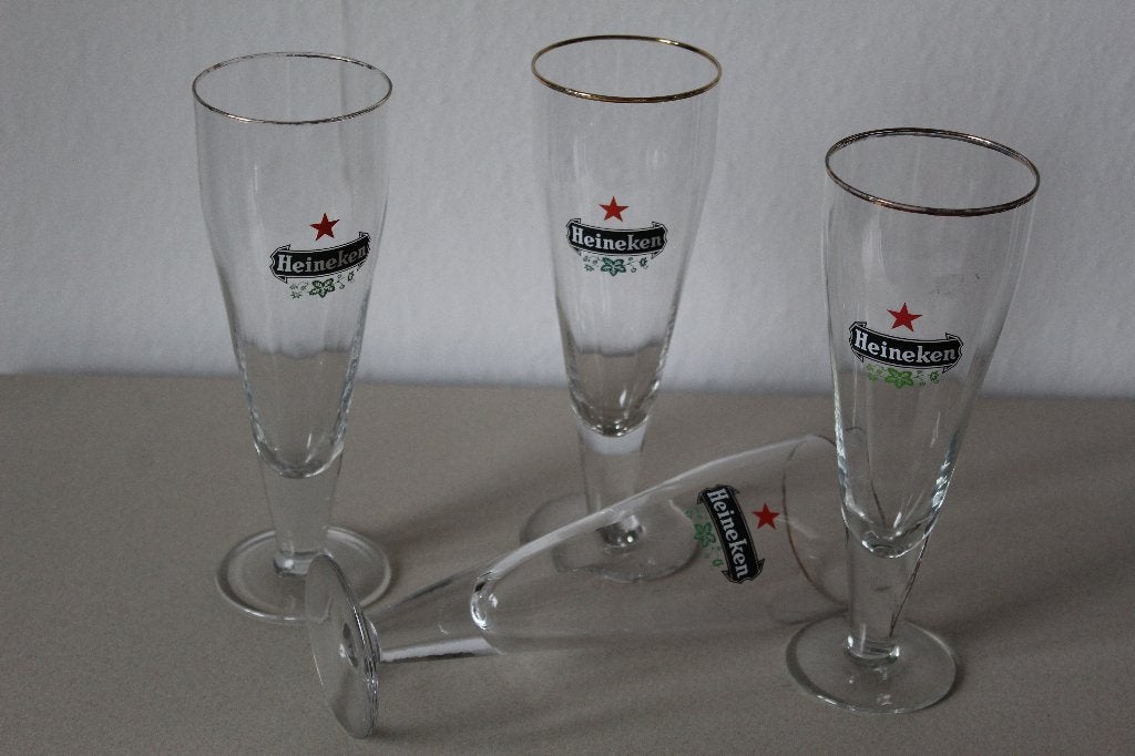 4 Heineken bierglazen - Bierglas met gouden bies, Ophalen of Verzenden, Gebruikt, Bierglas