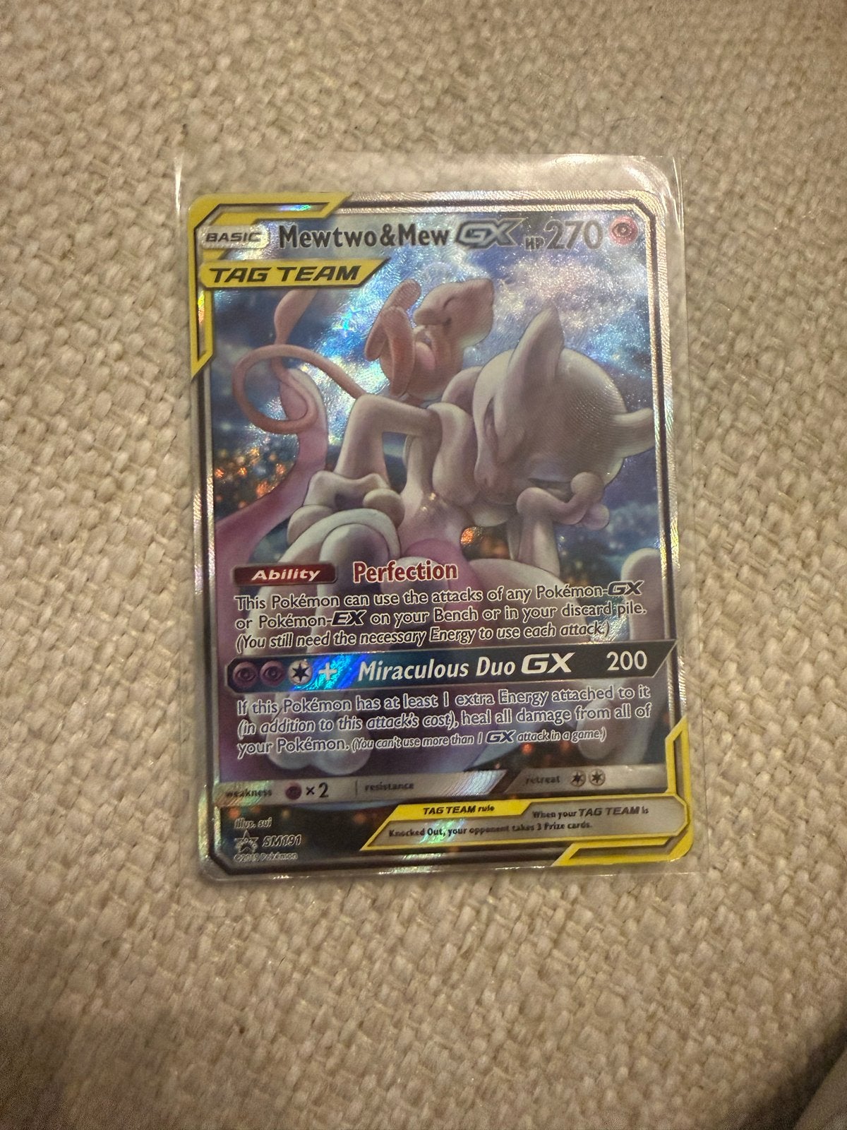 Mewtwo & Mew GX SM191 Pokémon Kaart - Tag Team, Ophalen of Verzenden, Zo goed als nieuw, Losse kaart, Foil