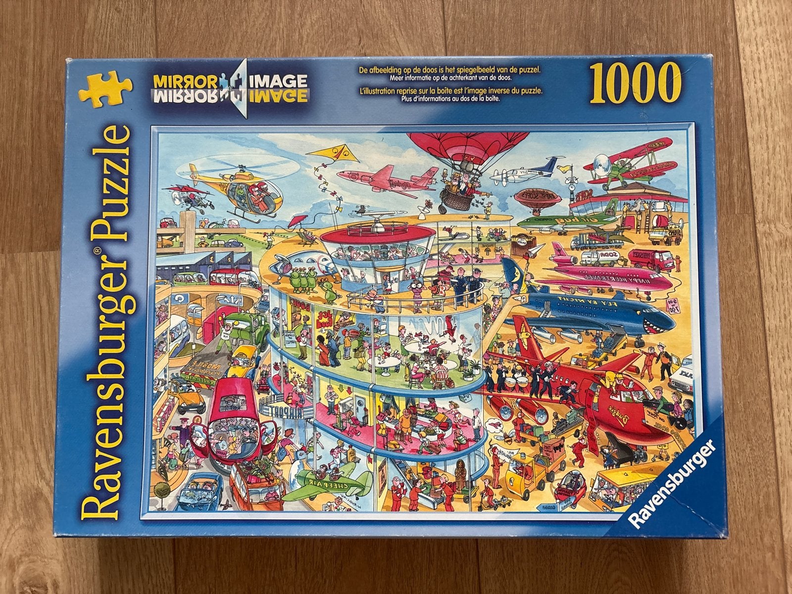 Ravensburger Mirror Image Puzzel - Vliegveld 1000 stukjes, Hobby en Vrije tijd, Denksport en Puzzels, Ophalen, 500 t/m 1500 stukjes