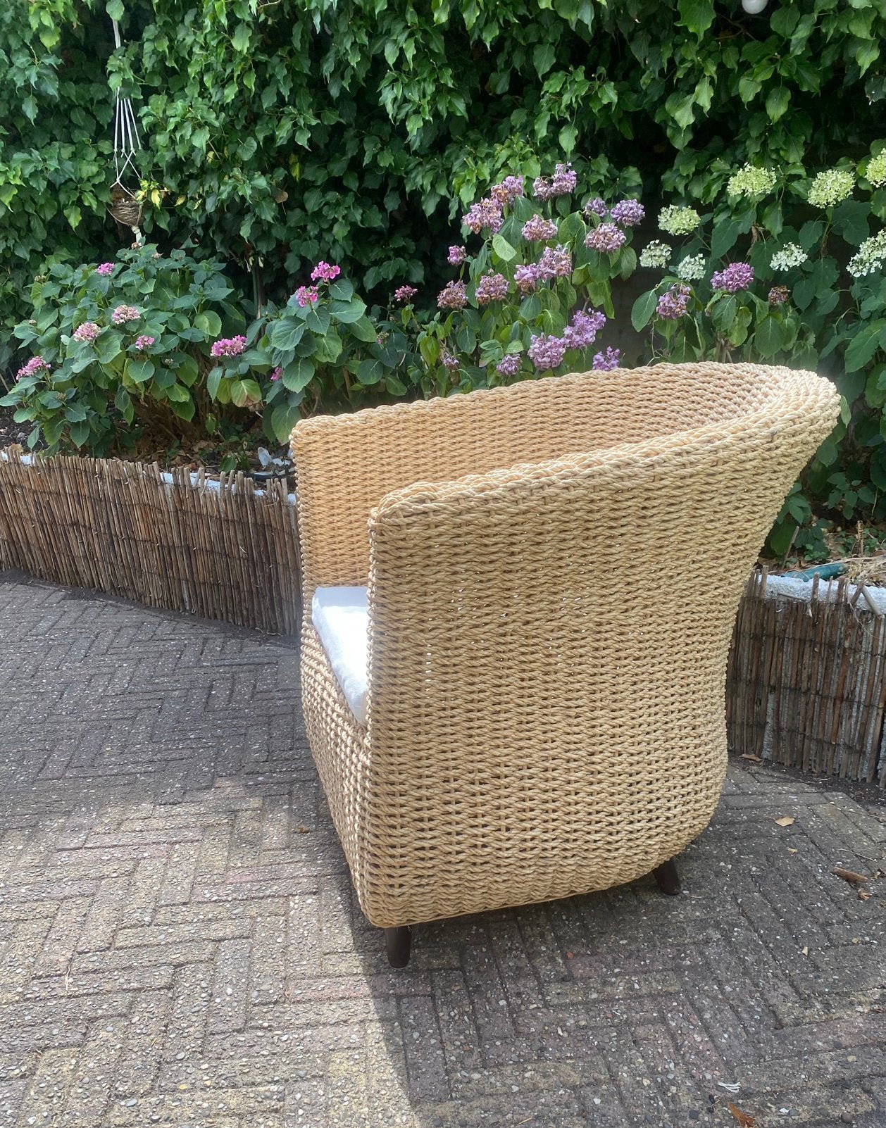 Rotan , rieten stoel met kussen, Tuin en Terras, Tuinstoelen, Ophalen, Zo goed als nieuw, Rotan