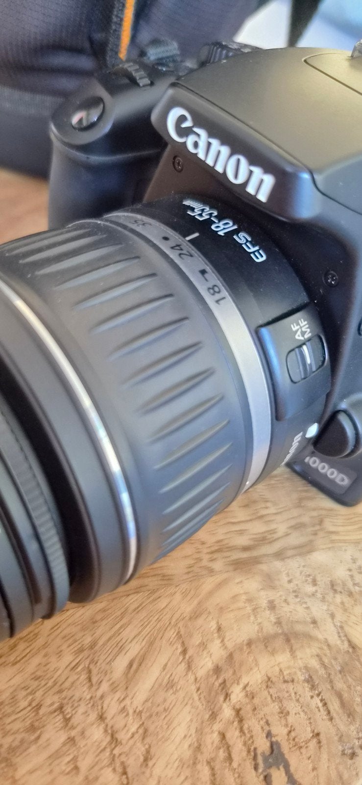 Foto 4 van Canon EOS 1000D met 2 lenzen en accessoires