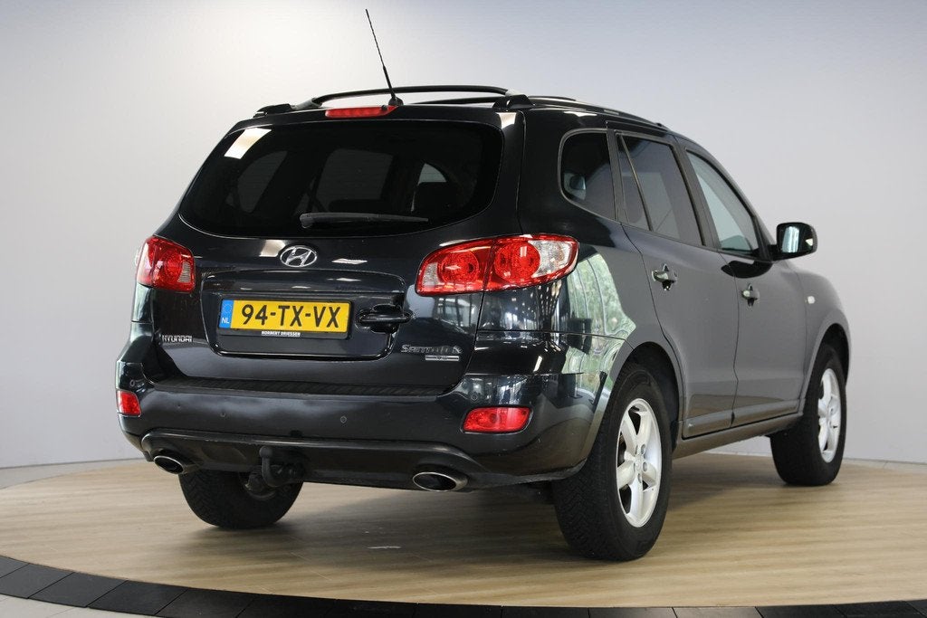 Hyundai Santa Fe 2.7i V6 Dynamic 7p. | Trekhaak | Youngtimer, Auto's, Hyundai, Voorwielaandrijving, Gebruikt, 2000 kg, Zwart