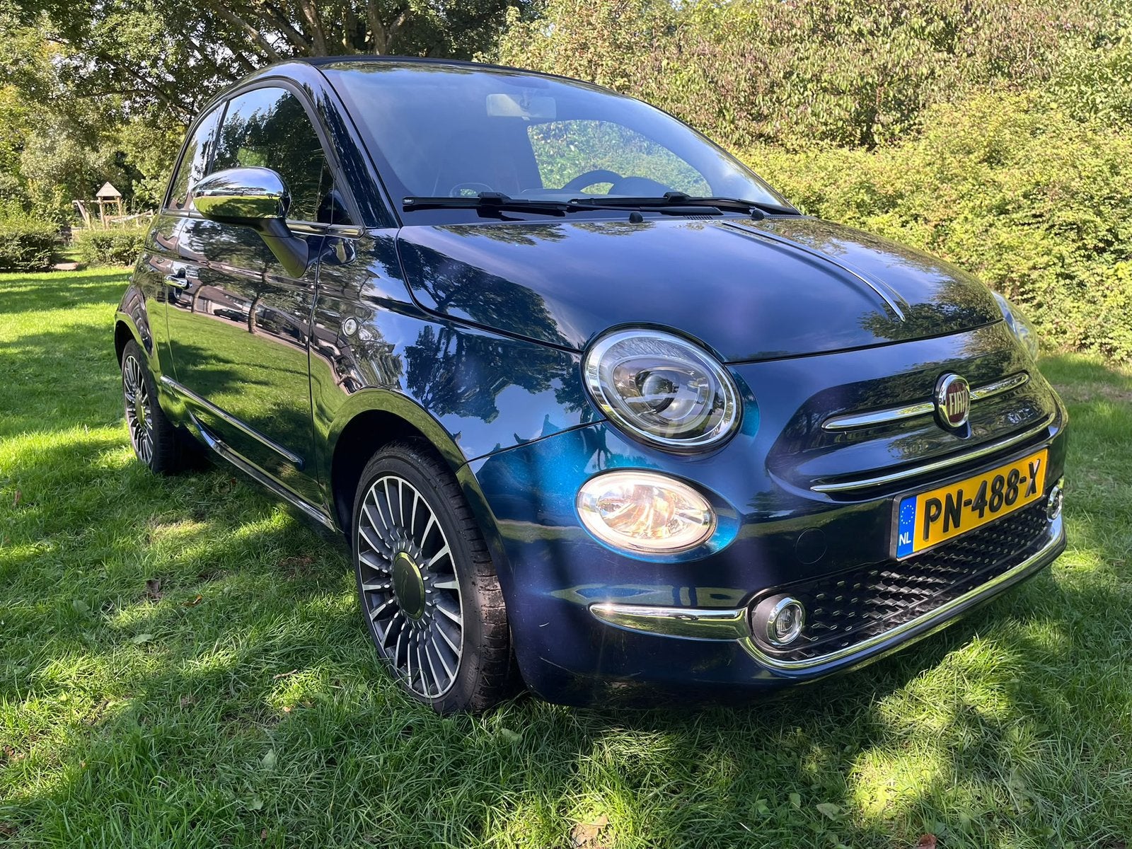 Foto 3 van Fiat 500 C 1.2 AUT 2016 Blauw. Cabrio. Abarth leather seats