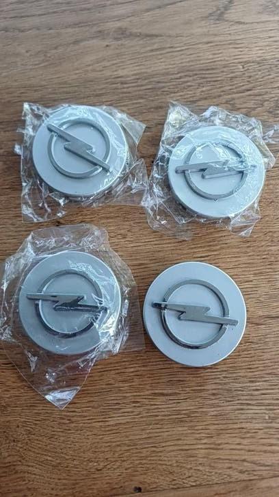 4 Opel naafdoppen 58 mm NIEUW, Ophalen of Verzenden, Nieuw, Opel