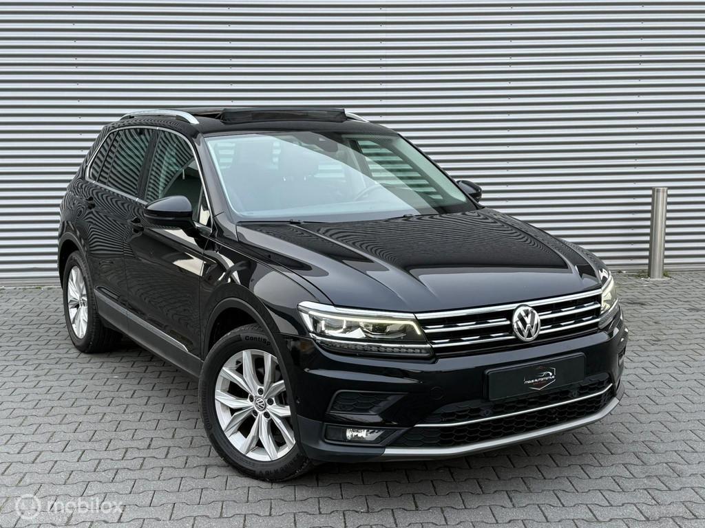 Volkswagen Tiguan 1.5 TSI Comfortline Business, Auto's, 4 cilinders, Alcantara, Zwart, Bedrijf