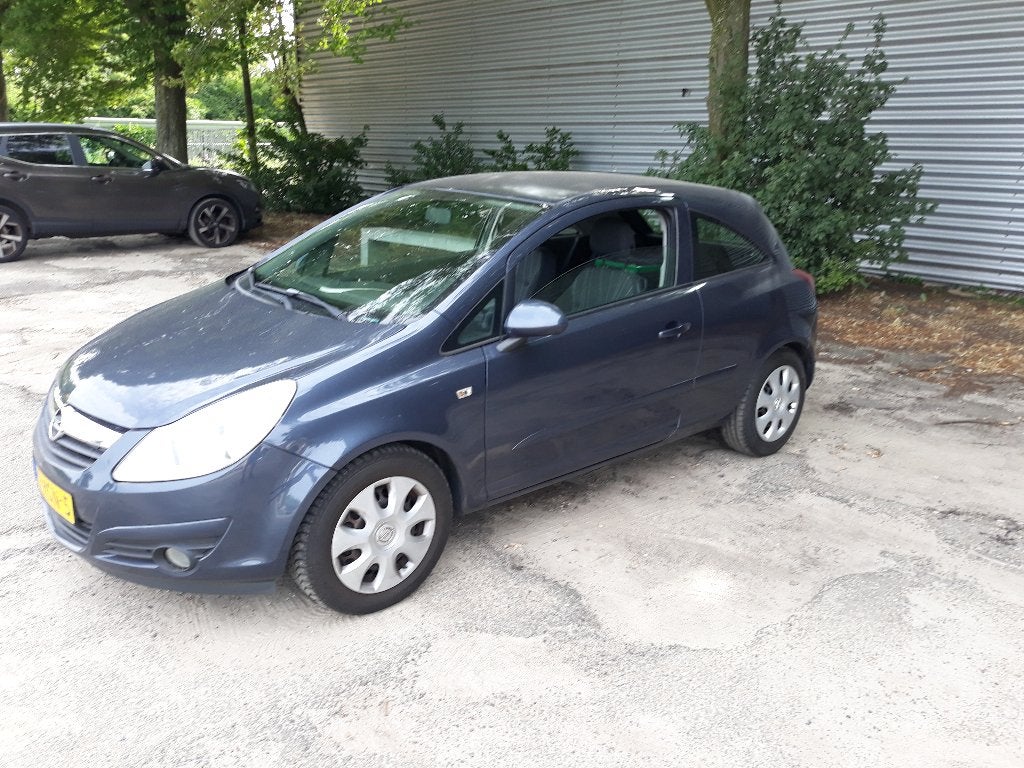 OPEL CORSA-2009-APK 26 DECEMBER 2026-750 EURO-LEES TEKST, Auto's, Opel, Stof, Handgeschakeld, 1400 cc, Grijs