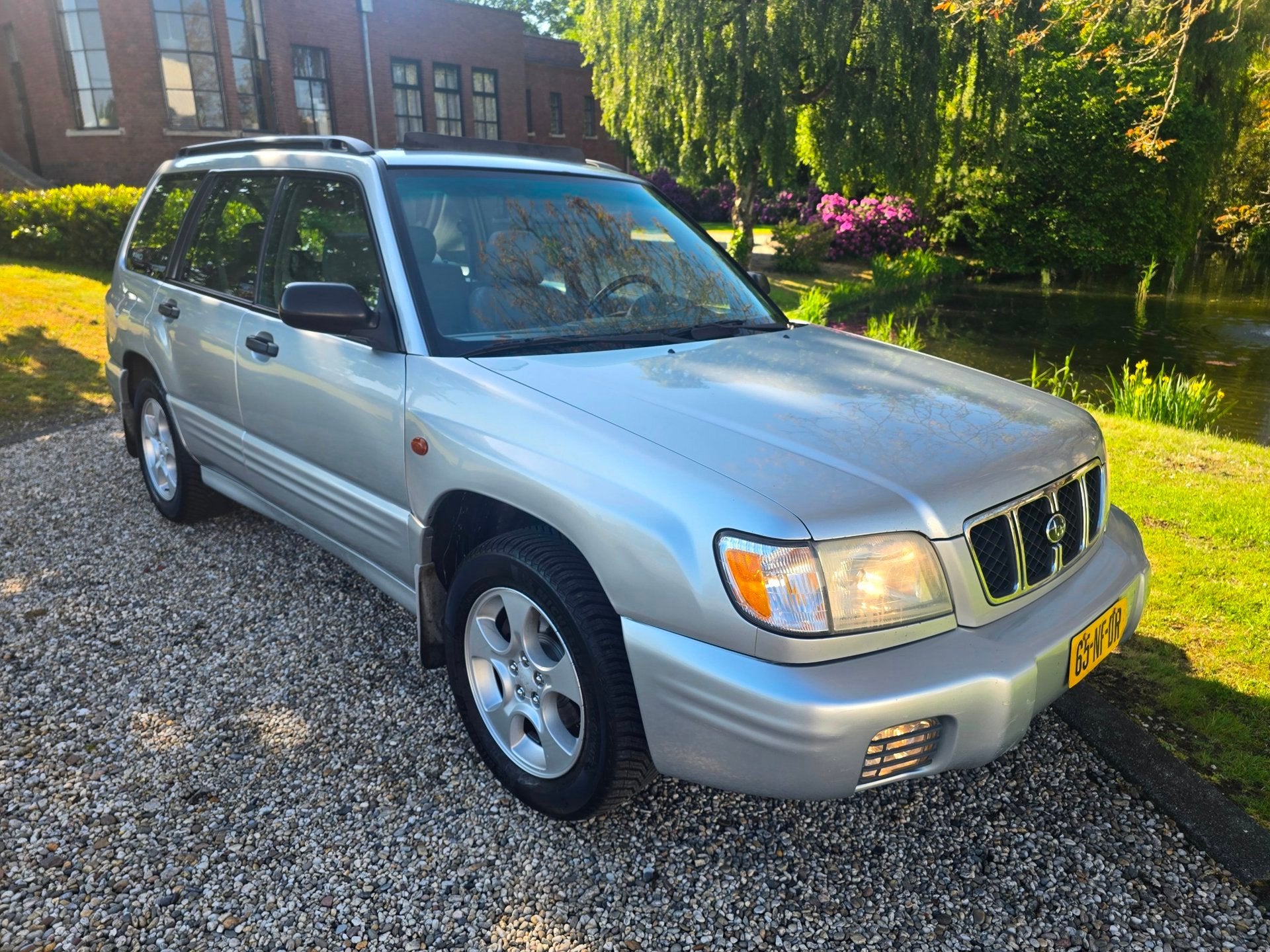 Subaru FORESTER 2.5 automaat Airco trekhaak Amerikaanse uitv, Auto's, Gebruikt, Leder, Forester, 1470 kg