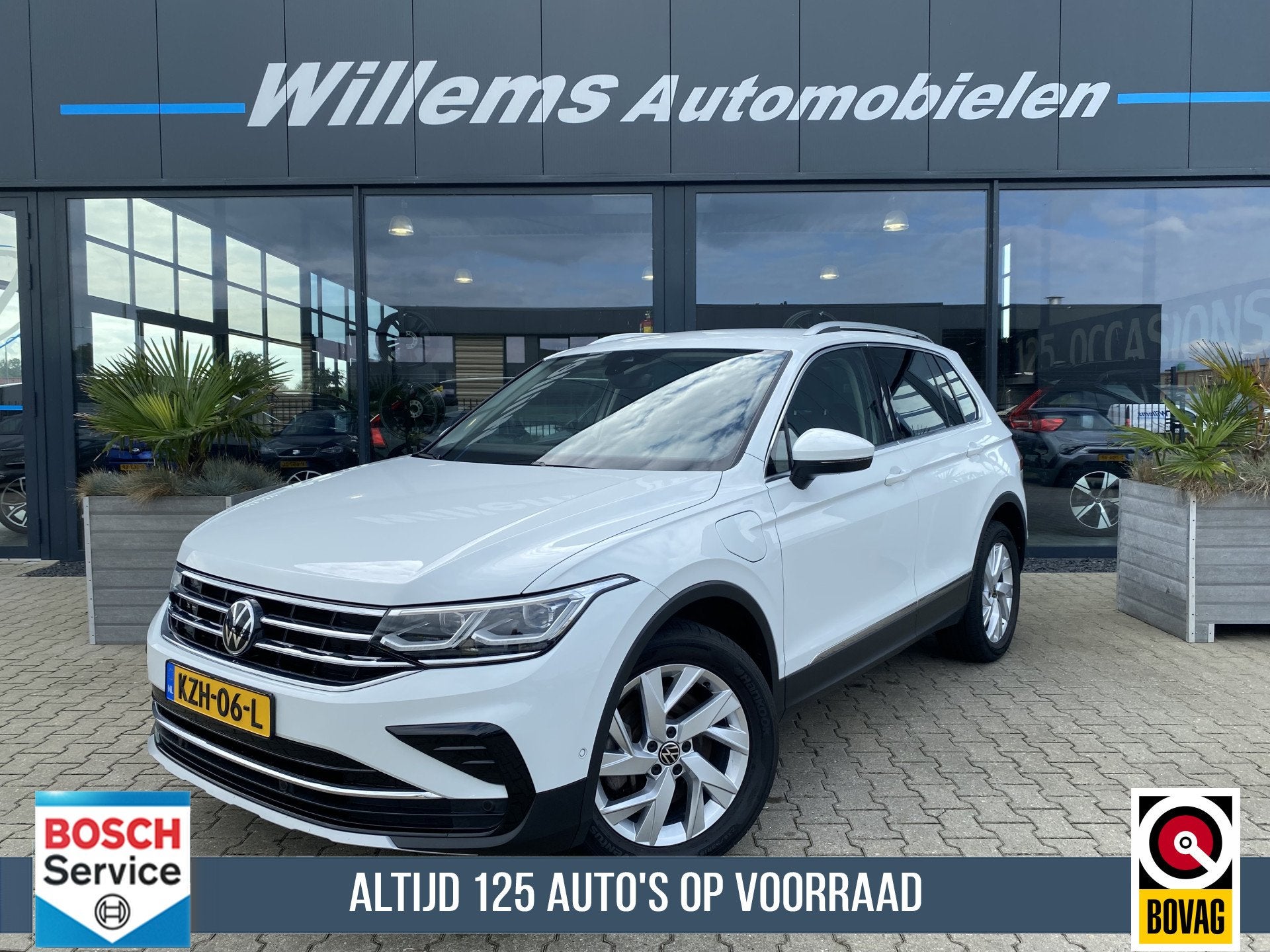 Volkswagen Tiguan 1.4 TSI eHybrid Business+ Trekhaak Wegklap, Auto's, 4 cilinders, Met garantie (alle), Alcantara, Wit