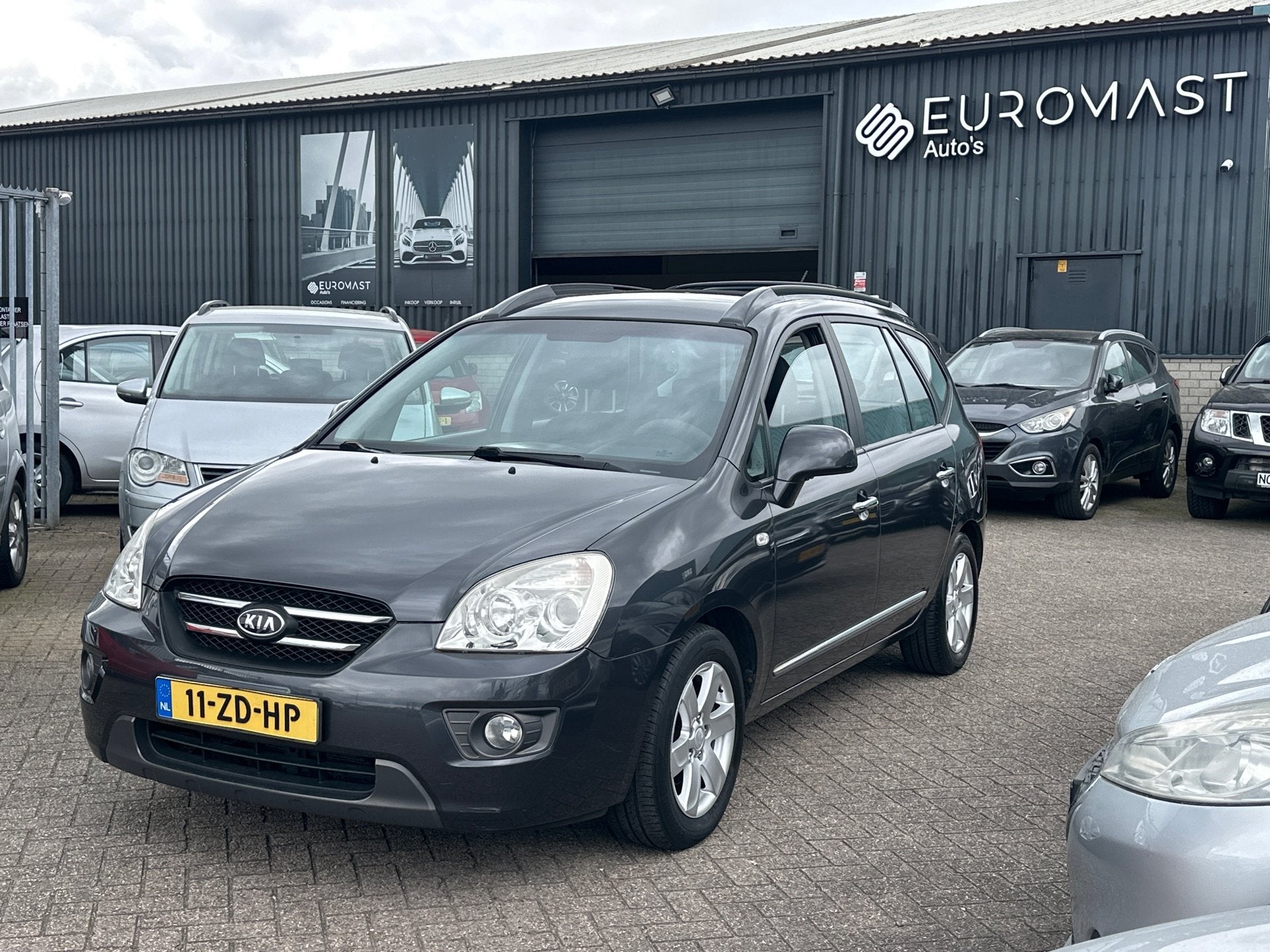 Kia Carens 2.0 CVVT X-ecutive Airco Nieuw apk Trekhaak PDC, Auto's, Voorwielaandrijving, 1998 cc, Stof, Gebruikt