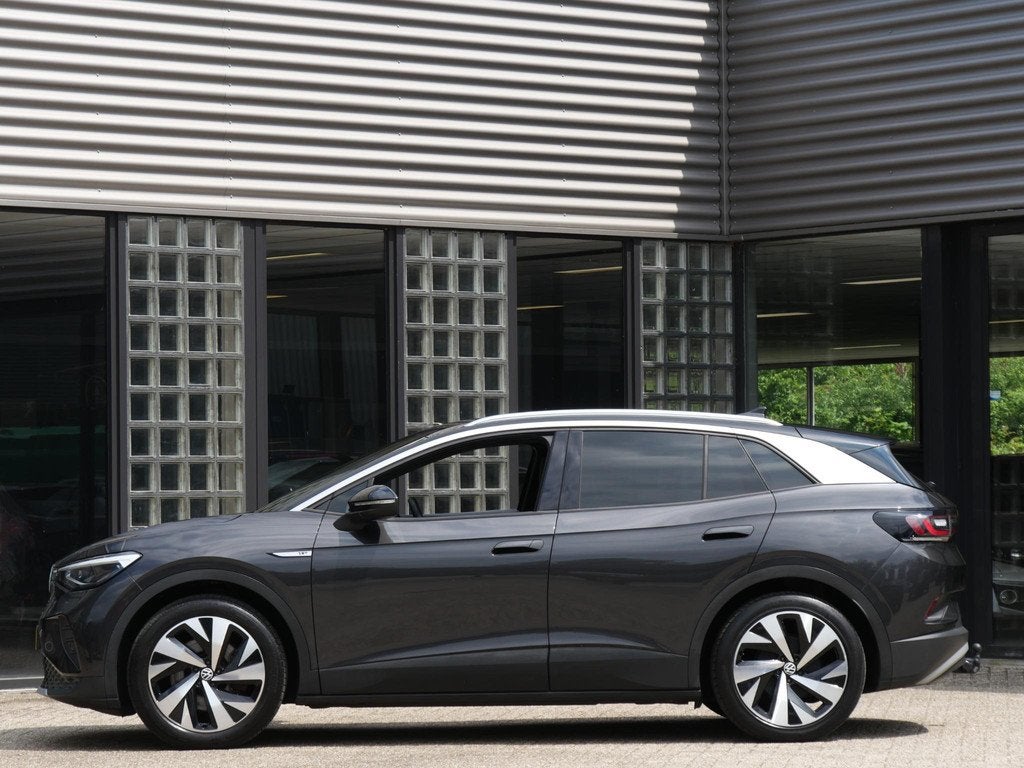 Volkswagen ID.4 77kWh 1ST/ CAMERA/ TREKHAAK/ 20INCH VELGEN/, Auto's, Volkswagen, Automaat, Achterwielaandrijving, Gebruikt, Leder en Stof