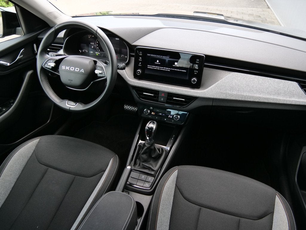 Skoda Kamiq 1.0 TSI Business Edition 116 Pk Automaat DAB / A, Auto's, Skoda, Stof, Zwart, 3 cilinders, Kamiq
