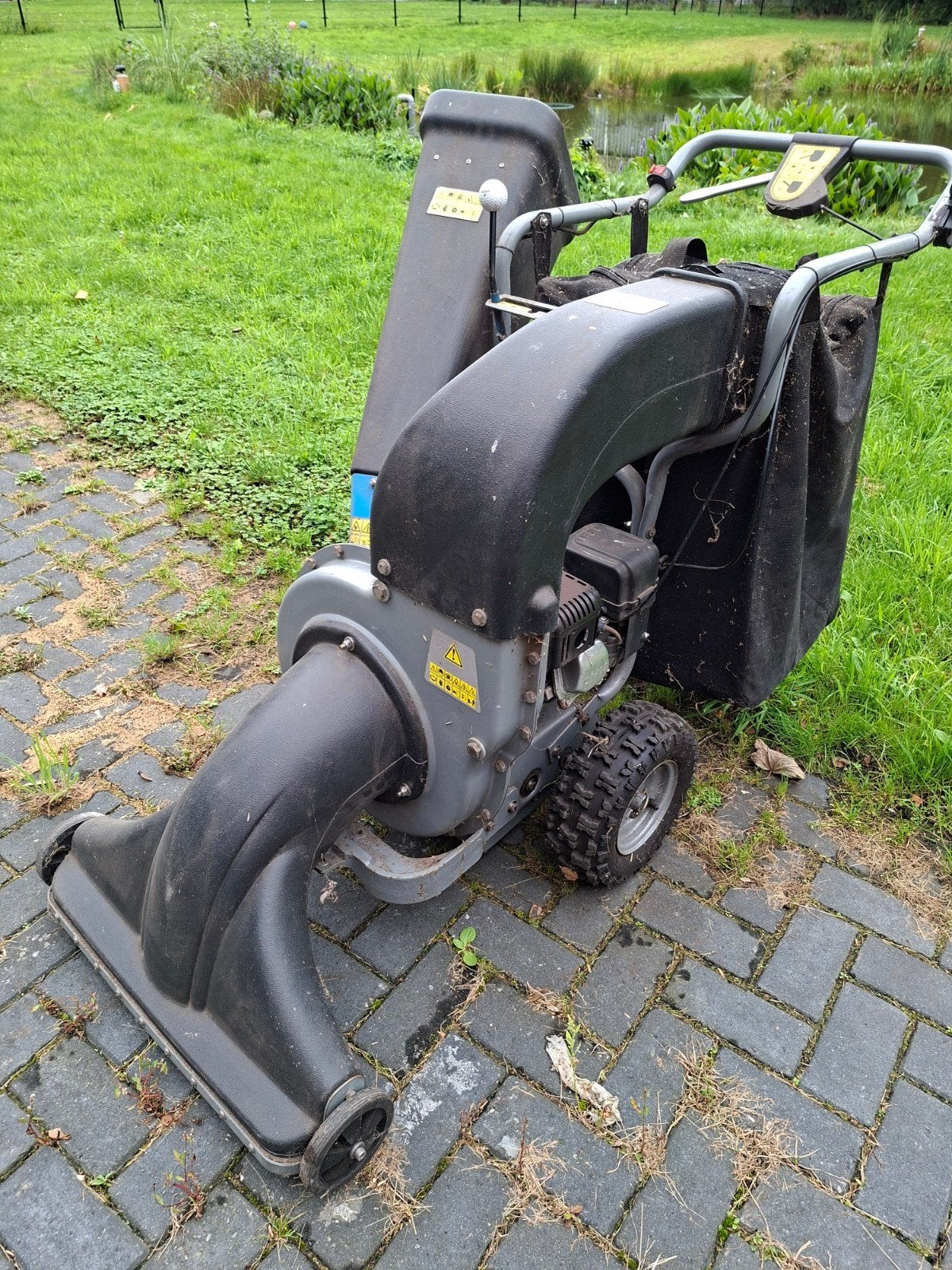 Bladzuiger en takkenversnipperaar Güde GSH 6500 B, Tuin en Terras, Benzine, Gebruikt, Met opvangzak, Handgedragen
