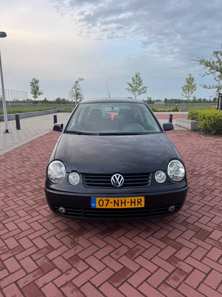 Volkswagen Polo 1.4 55KW 2003 Zwart, Voorwielaandrijving, 4 cilinders, Zwart, Origineel Nederlands