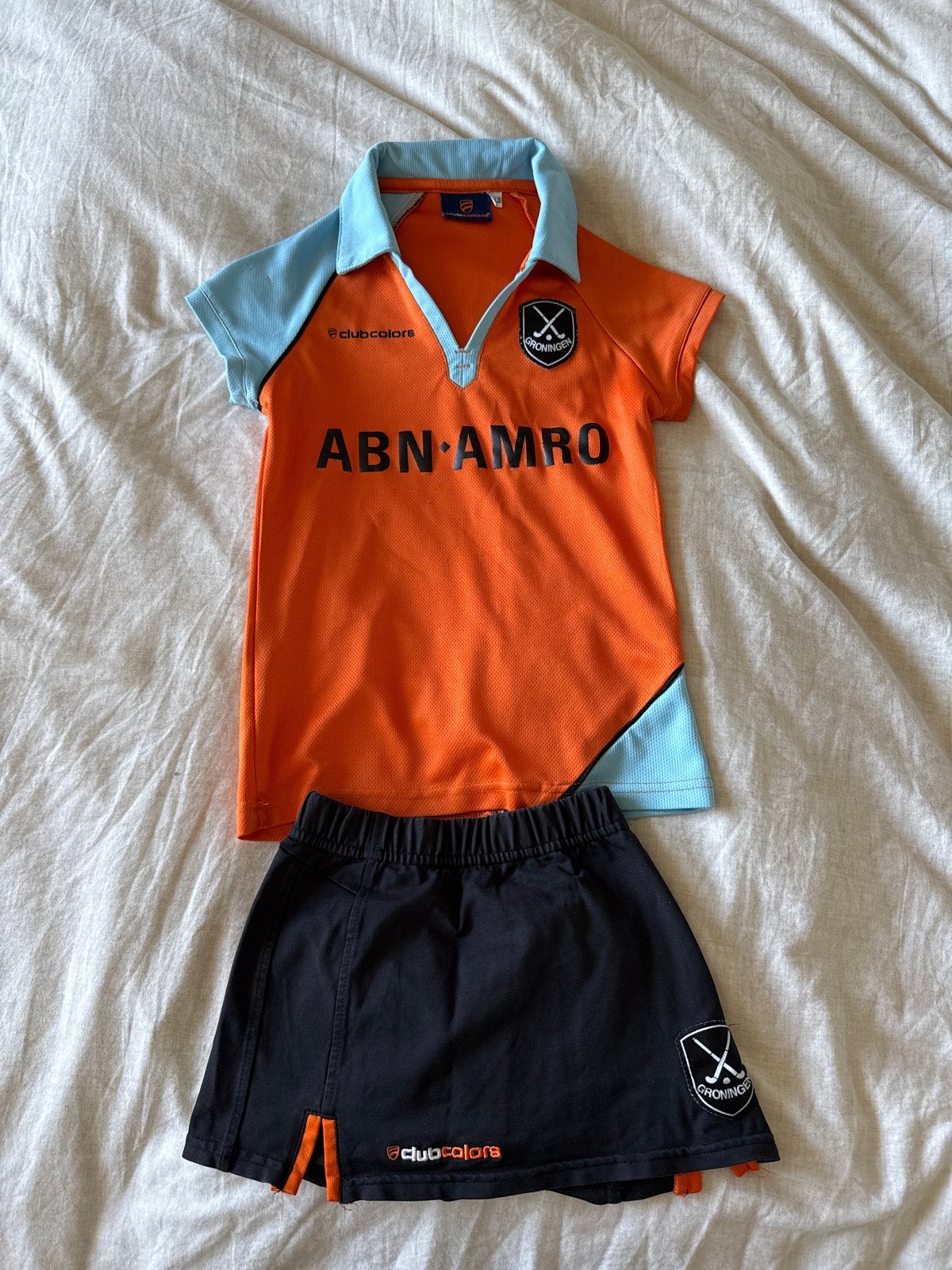 Hockeytenue HC Groningen (shirt en rokje) maat 128, Sport en Fitness, Hockey, Ophalen, Gebruikt, Kleding