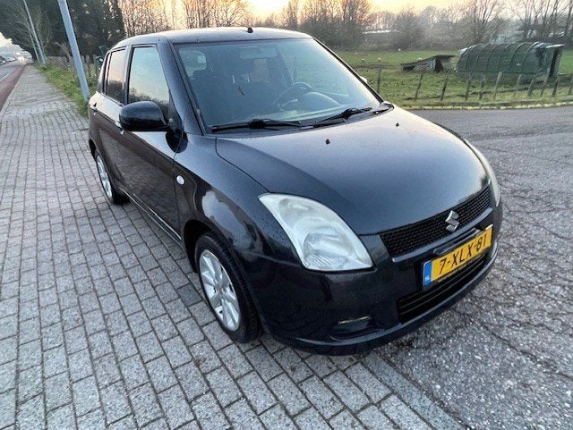 Suzuki Swift 1.3 5D 2007 Zwart LPG3, Auto's, Voorwielaandrijving, 40 €/maand, 965 kg, 400 kg