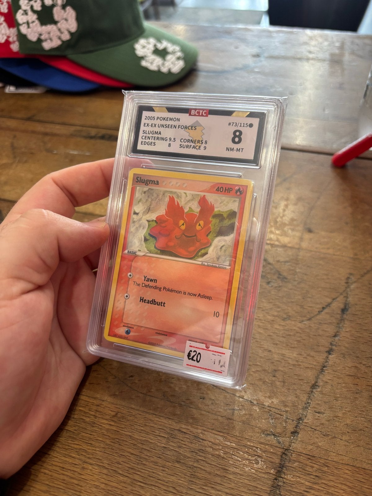 Pokémon Slugma BCTC Graded 8 NM-MT - EX Unseen Forces, Ophalen of Verzenden, Zo goed als nieuw, Losse kaart
