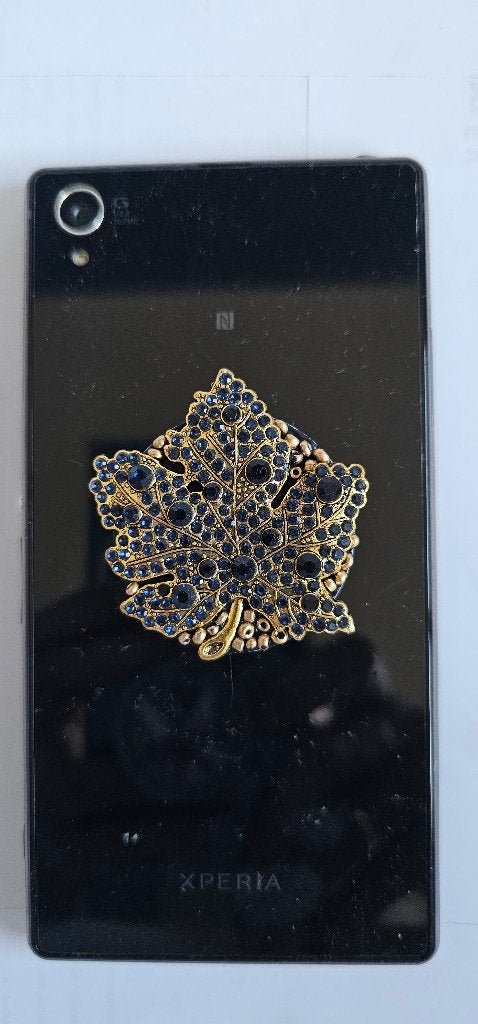 Gouden blad popsocket met blauwe steentjes, Ophalen of Verzenden, Zo goed als nieuw, Telefoonhanger of Accessoire, Universeel