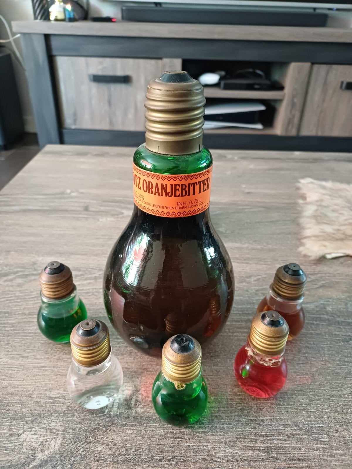 Bootz Oranjebitter fles met miniatuur gloeilampflesjes, Ophalen of Verzenden, Gebruikt