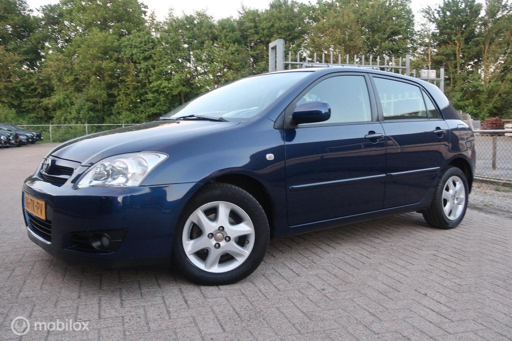 Toyota Corolla 1.6 VVT-i Anniversary, Auto's, Voorwielaandrijving, Automatische klimaatregeling, Gebruikt, Zwart