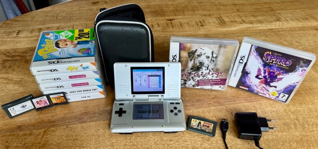 Nintendo DS NTR-001 + 11 games + oplader & hoes | Getest, Spelcomputers en Games, Met games, Gebruikt, DS Original of Phat, Ophalen of Verzenden