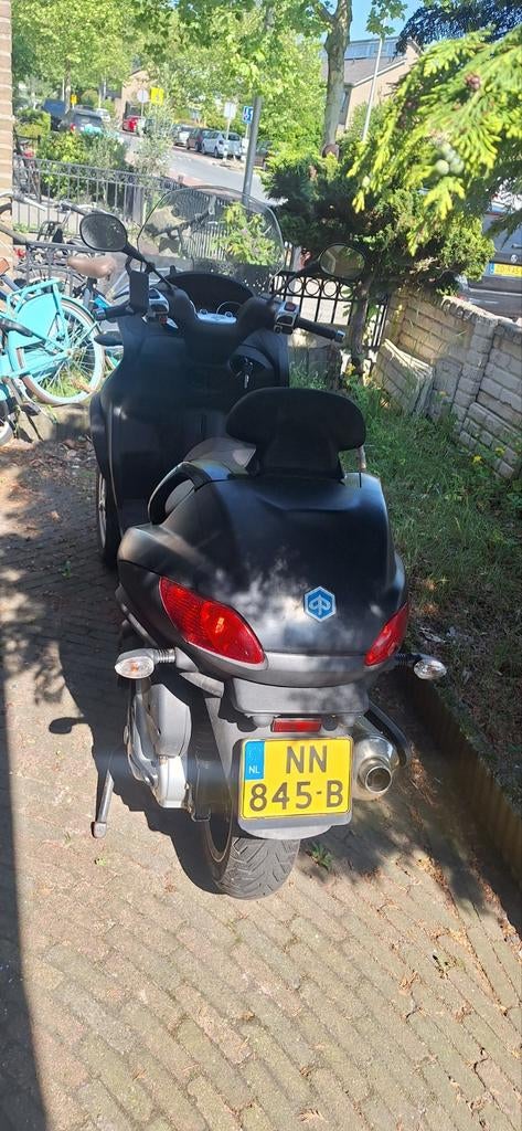 Piaggio 400ie van bouwjaar 2010., Fietsen en Brommers, Scooters | Piaggio, Ophalen