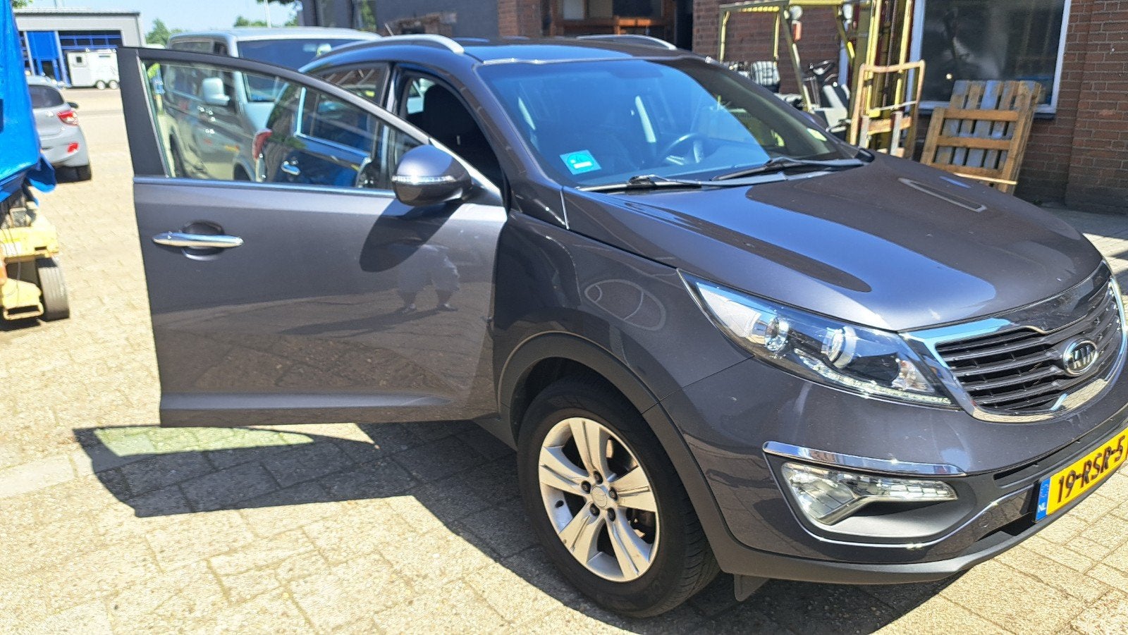 Kia Sportage 1.6 GDI 135pk Ecodynamics 2011 Grijs, Auto's, Voorwielaandrijving, 1280 kg, 4 cilinders, Leder en Stof