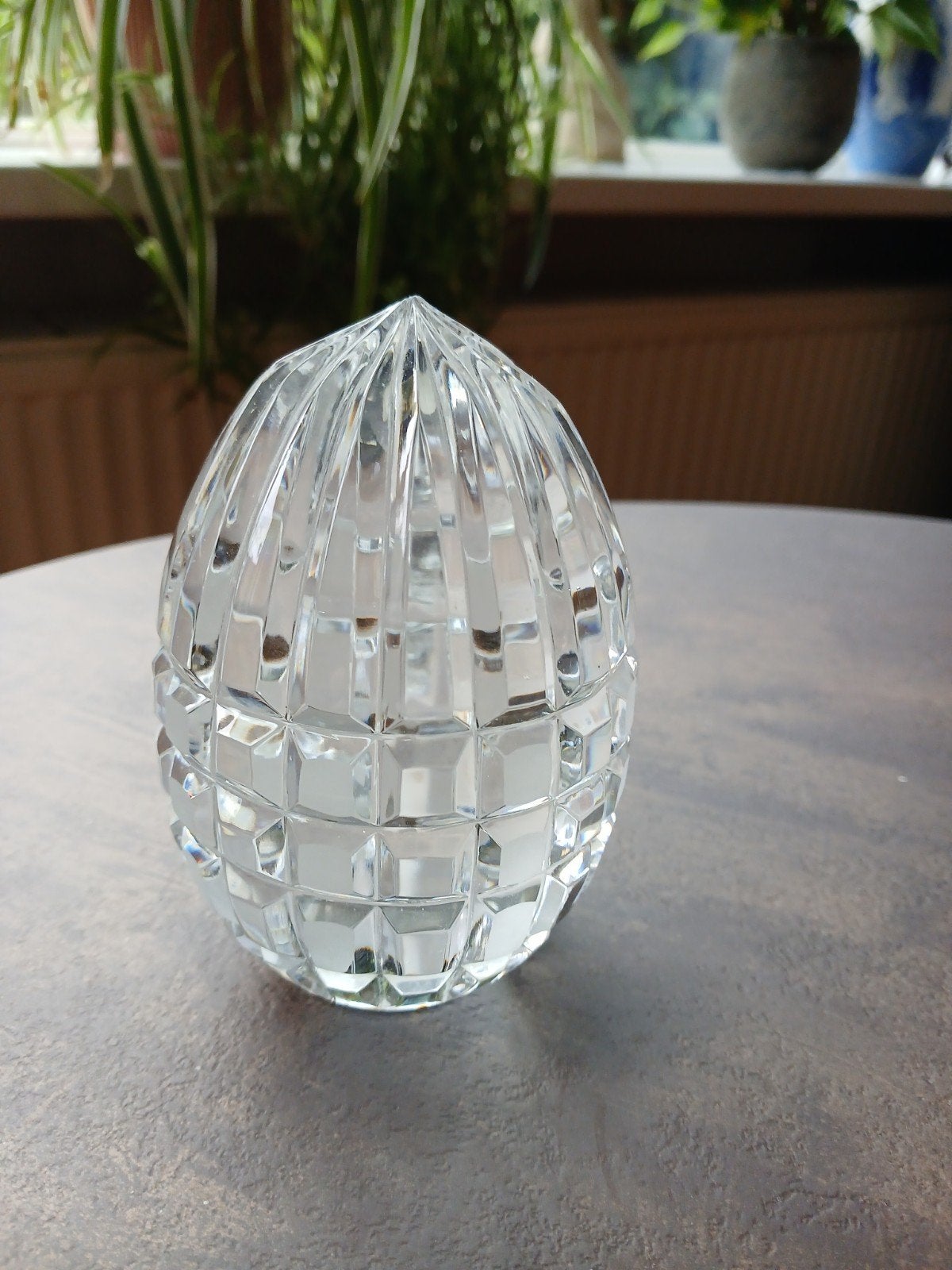 presse papier kristal, Ophalen