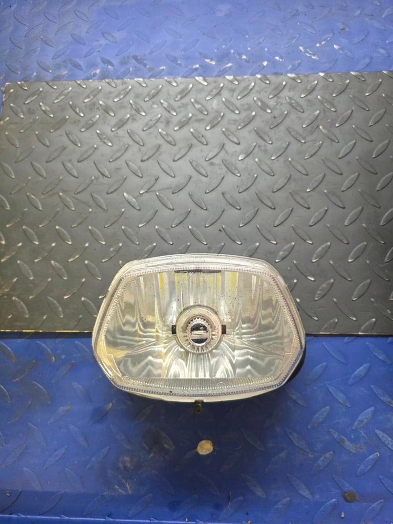 Vespa Sprint voorlicht wit, Ophalen