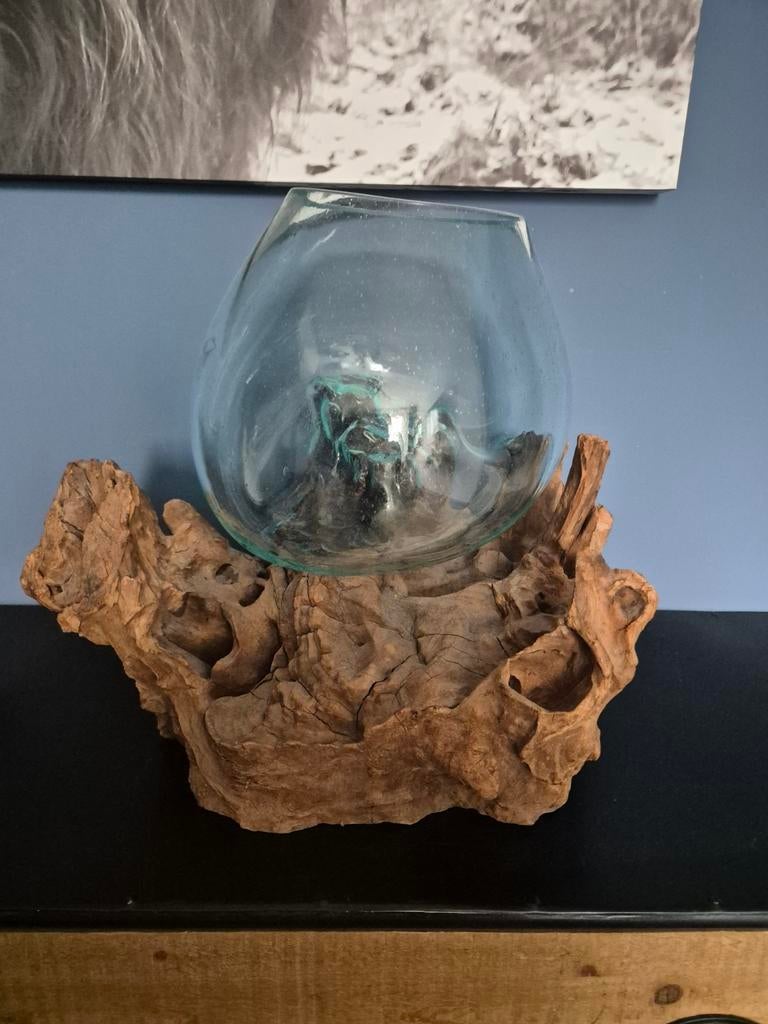 Glazen stulp op hout, Ophalen